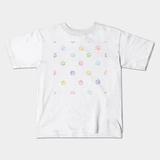 Pastel colored doodle paw prints Kids T-Shirt